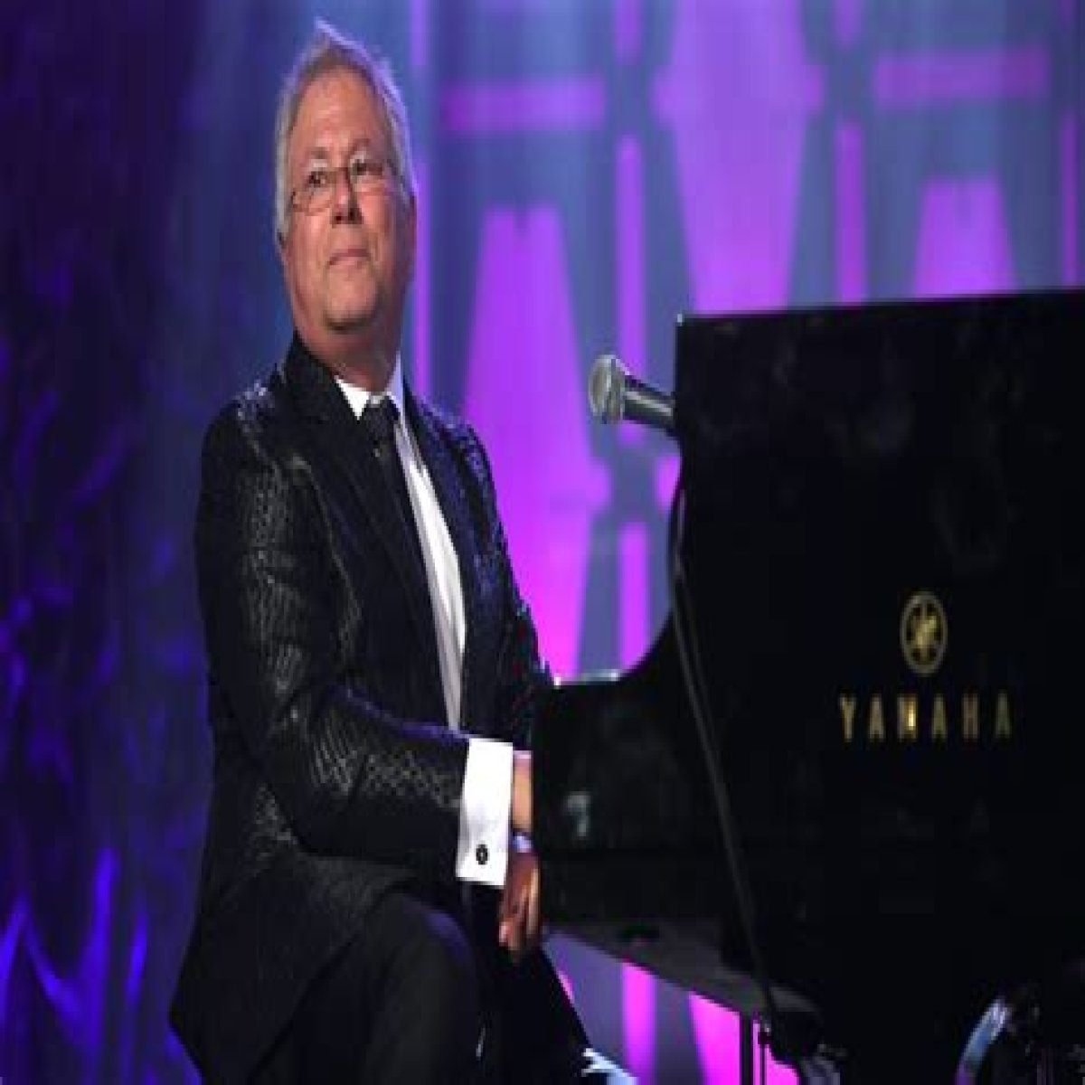 Aladdin and Pocahontas composer and songwriter who completed his EGOT with an Emmy in 2020: 2 wds.