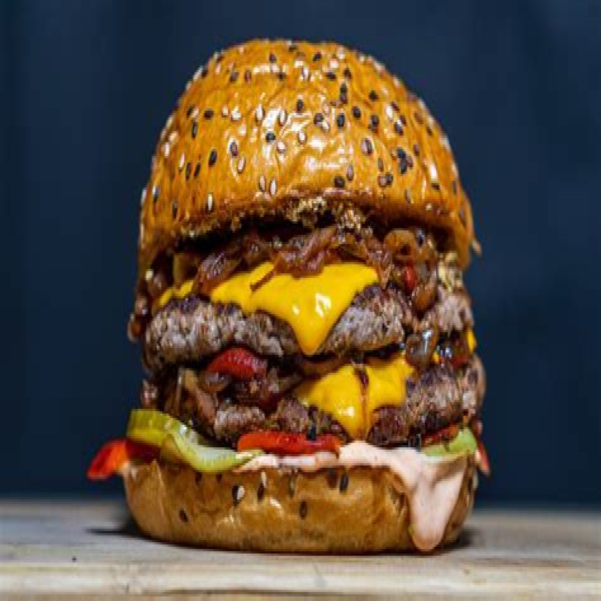 Big ___ (burgers that compete with Burger King's Whoppers)